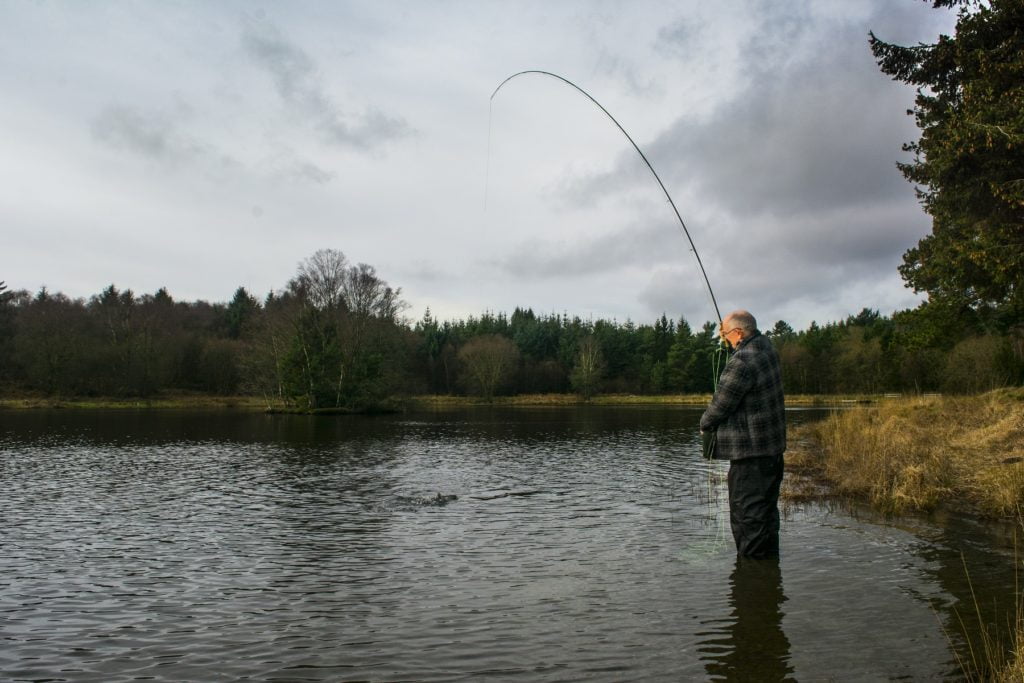 This image has an empty alt attribute; its file name is Fish-on-Local-fisherman-Roger-Lewis-1024x683.jpg