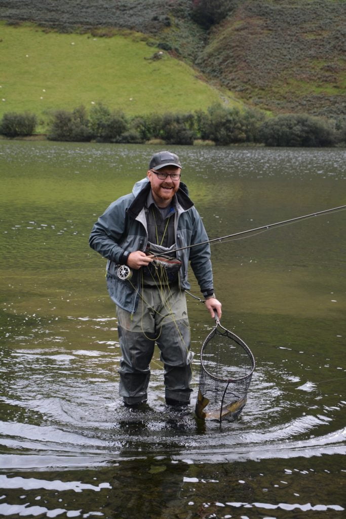 Lee Evans with a fantastic wild trout in the net from Tal-y-llyn