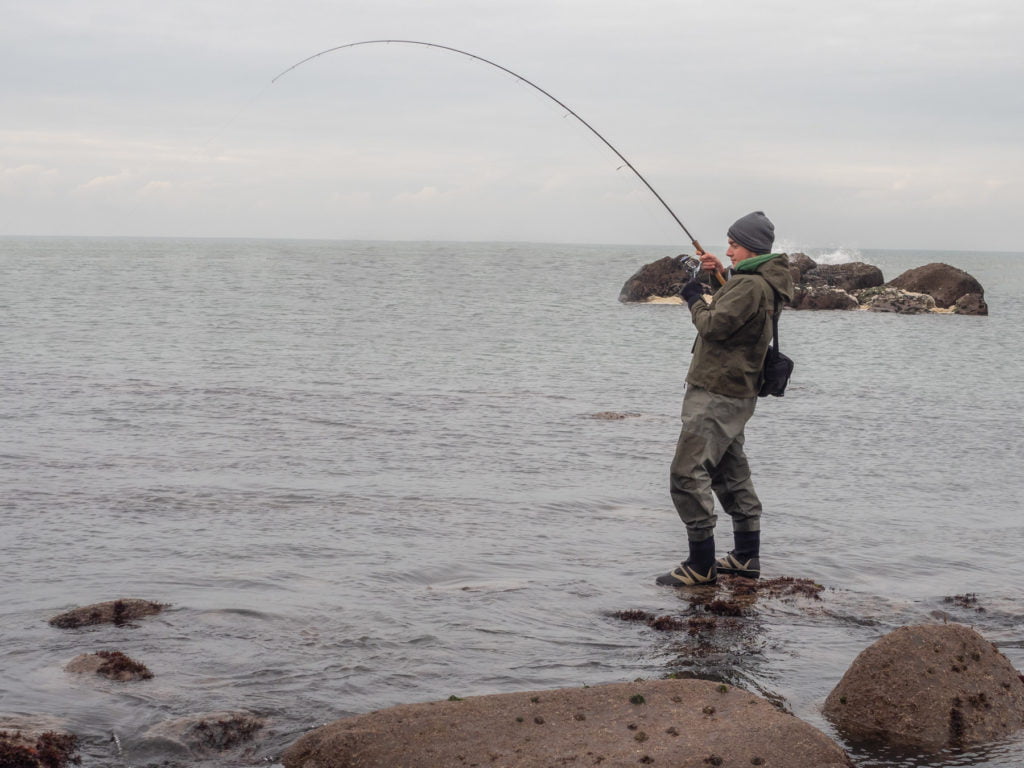 Spinning for bass with a long rod